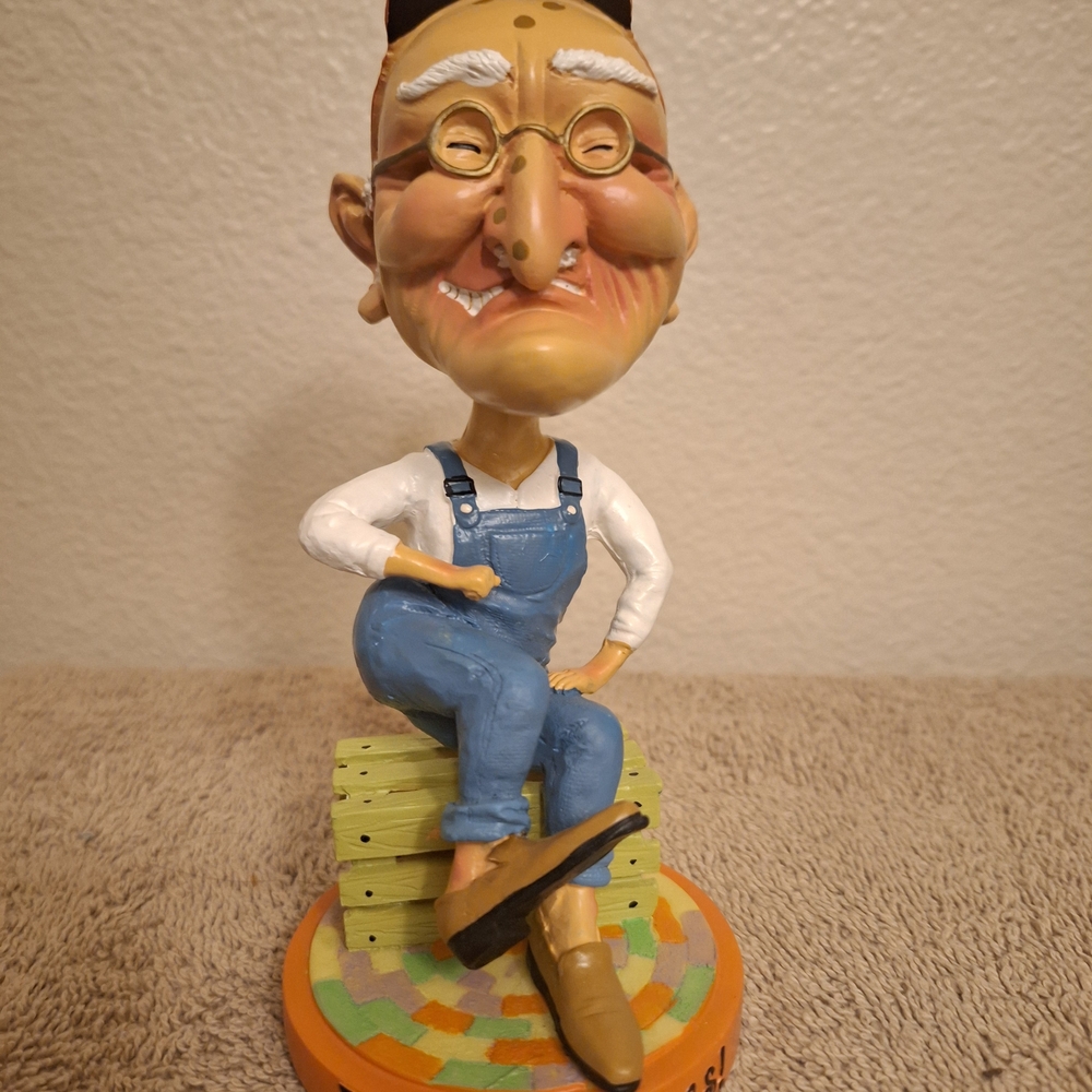 Whimsical Life Is A Gas Character Bobblehead in Blue Overalls